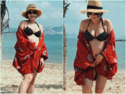 Bụng bầu lớn, Mi Vân vẫn tự tin diện bikini khi đi tắm biển dịp Tết