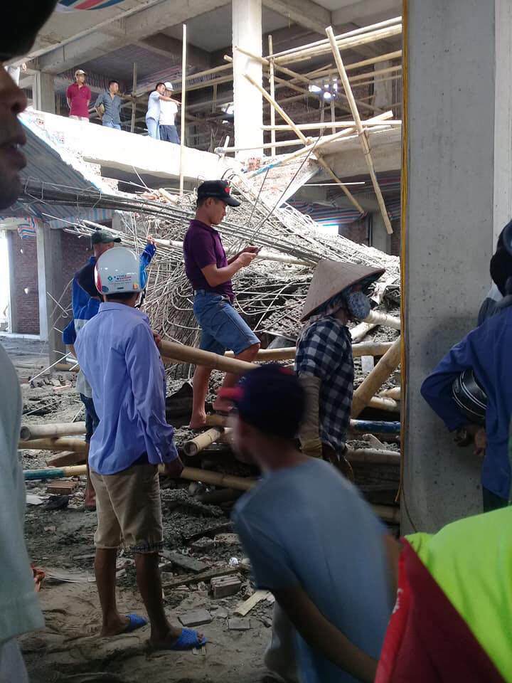 nong: sap gian giao sieu thi, nhieu nguoi bi chon vui duoi dong be tong - 1