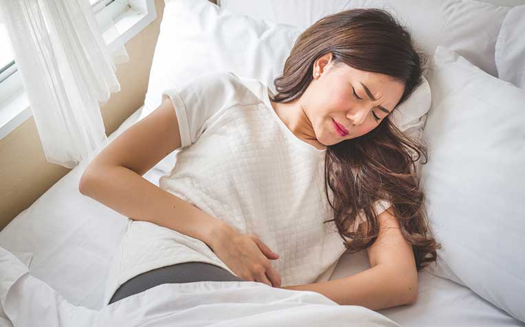 Nguyên nhân và cách chữa đau bụng kinh dữ dội - 1