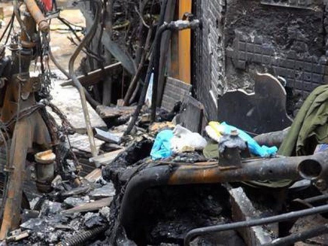 Hai ngày sau vụ cháy 8 người chết ở TPHCM: Tang thương bao phủ khu dân cư