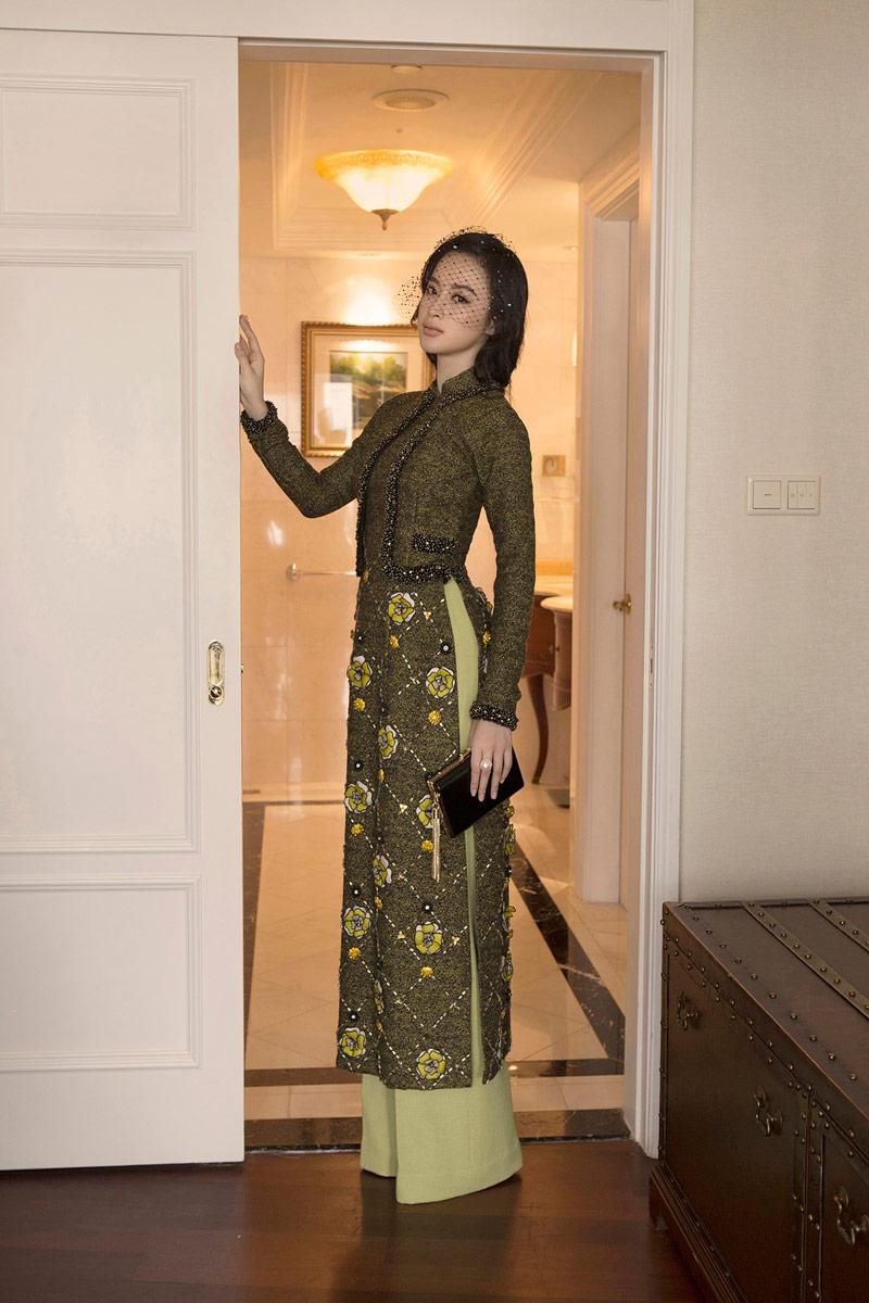 dien ao dai xinh dep, angela phuong trinh lai gay hoang mang vi nhu mat di mot canh tay - 9