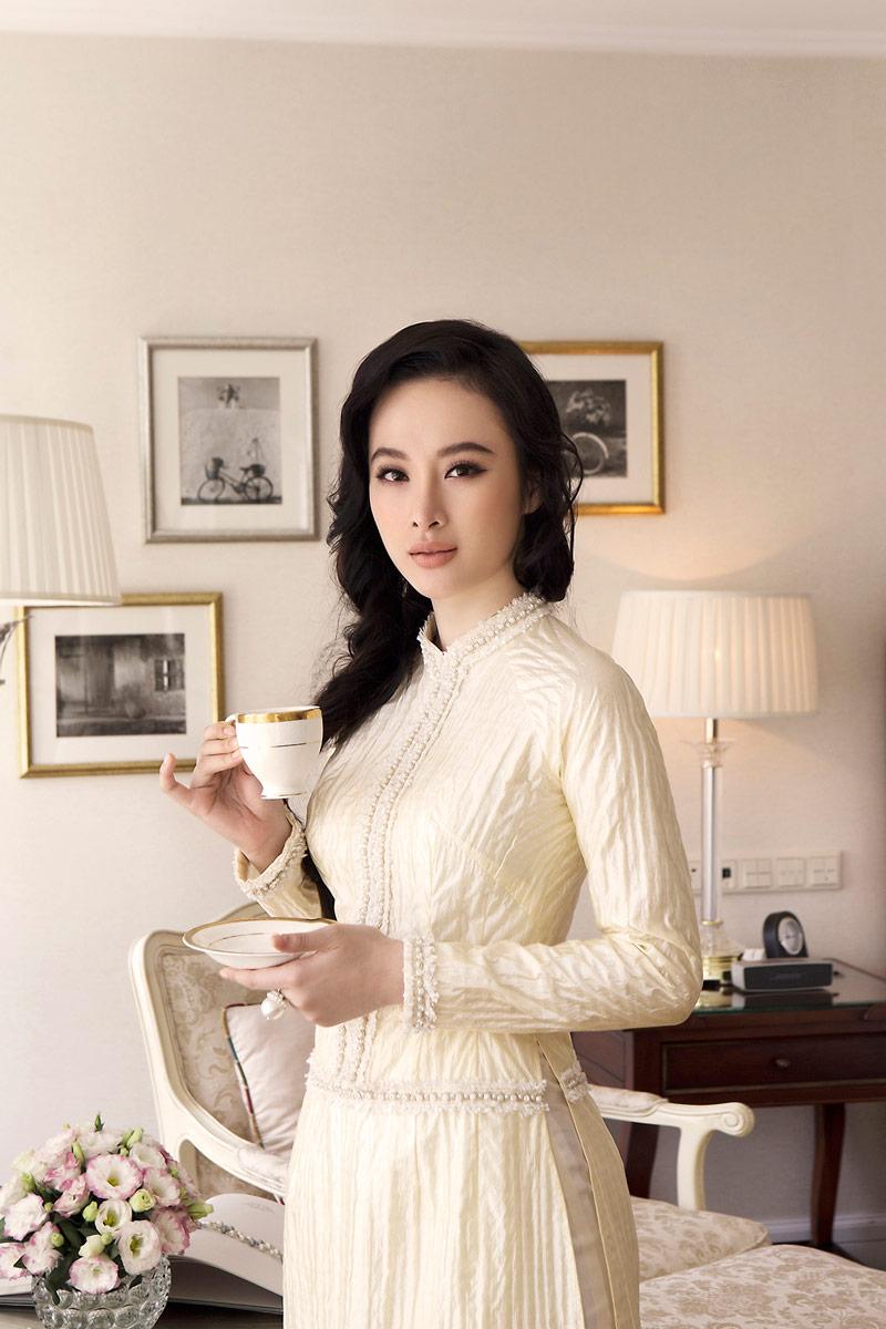 dien ao dai xinh dep, angela phuong trinh lai gay hoang mang vi nhu mat di mot canh tay - 3