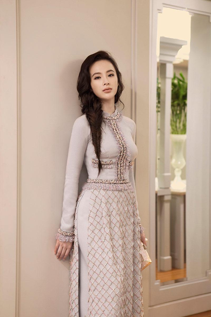 dien ao dai xinh dep, angela phuong trinh lai gay hoang mang vi nhu mat di mot canh tay - 6
