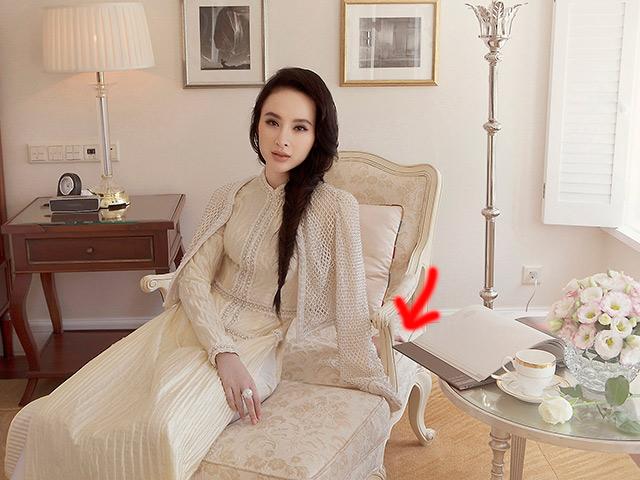 dien ao dai xinh dep, angela phuong trinh lai gay hoang mang vi nhu mat di mot canh tay - 2