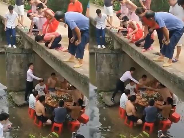 troi nong hon 40 do, ca ho ru nhau xuong gam cau, chan ngap nuoc an co cuoi - 1