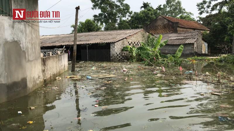 ngoai thanh ha noi khon kho vi nuoc ngap bon be, san sang di doi 14.000 ho dan - 1