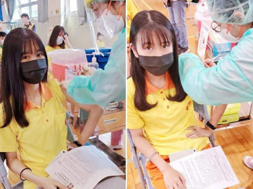 Cặp song sinh gây chú ý khi đi tiêm vaccine Covid-19, phản ứng sau tiêm trái ngược - Vimarsana News