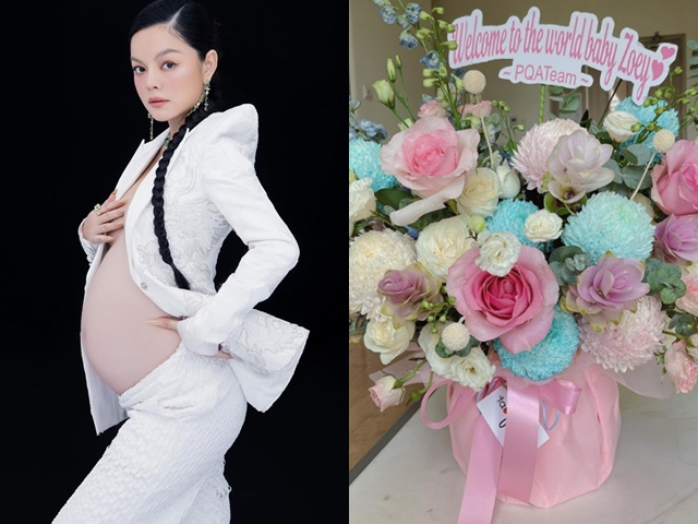 Phạm Quỳnh Anh nhận hoa với dòng chữ chúc mừng, được cho là đã sinh con thứ 3