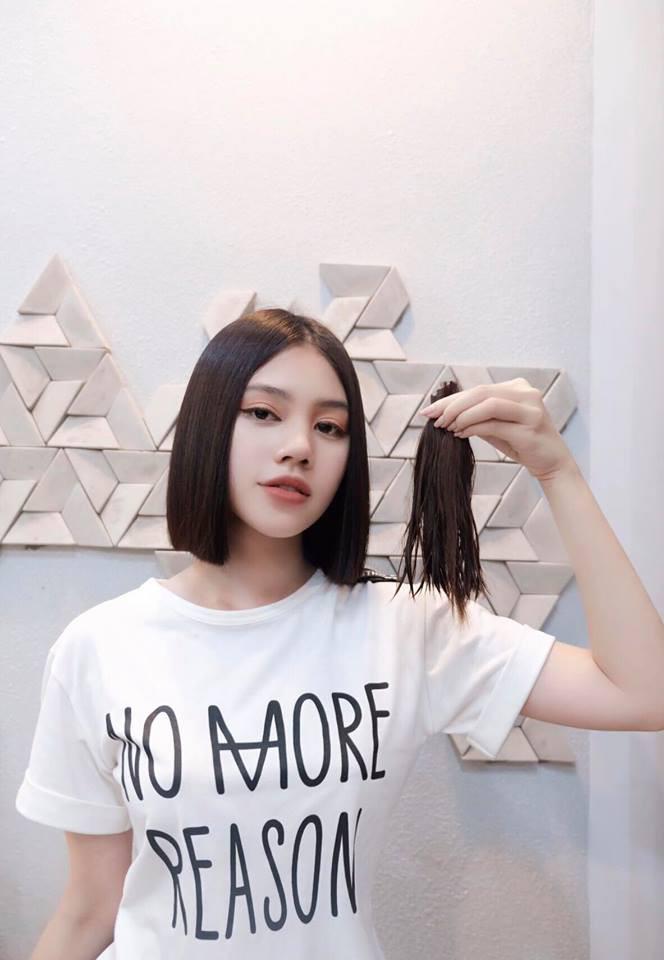 dau can toc dai den nhanh, nhung nang hoa hau viet voi mai toc ngan van du suc "doi doi" - 9