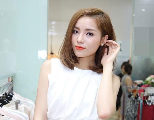 dau can toc dai den nhanh, nhung nang hoa hau viet voi mai toc ngan van du suc "doi doi" - 14