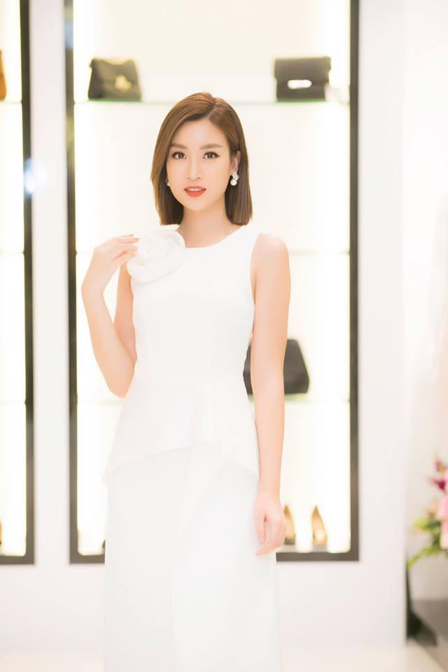 dau can toc dai den nhanh, nhung nang hoa hau viet voi mai toc ngan van du suc "doi doi" - 3