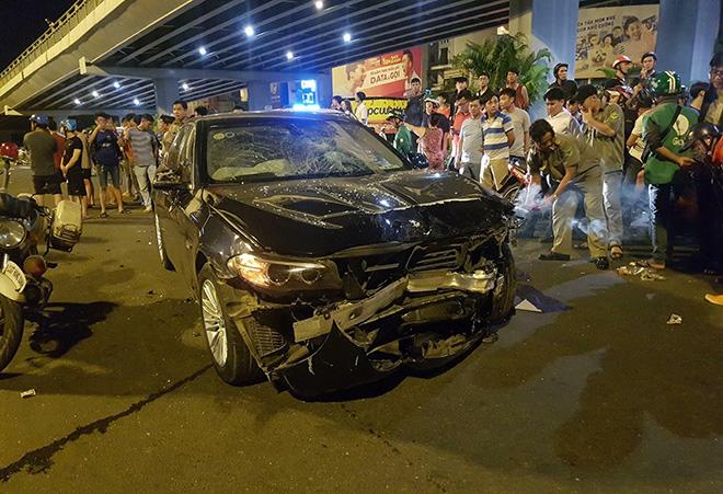 nu tai xe lai bmw gay tai nan kinh hoang, nhieu nguoi thuong vong - 4