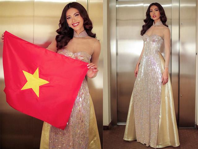 Đi thi quốc tế, Minh Tú diện áo dài xuyên thấu, cầm cờ chúc mừng Việt Nam tại AFF CUP