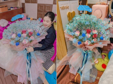 Vợ đi đẻ về được chồng tặng bó hoa ngập tiền và câu chuyện tình yêu bất ngờ